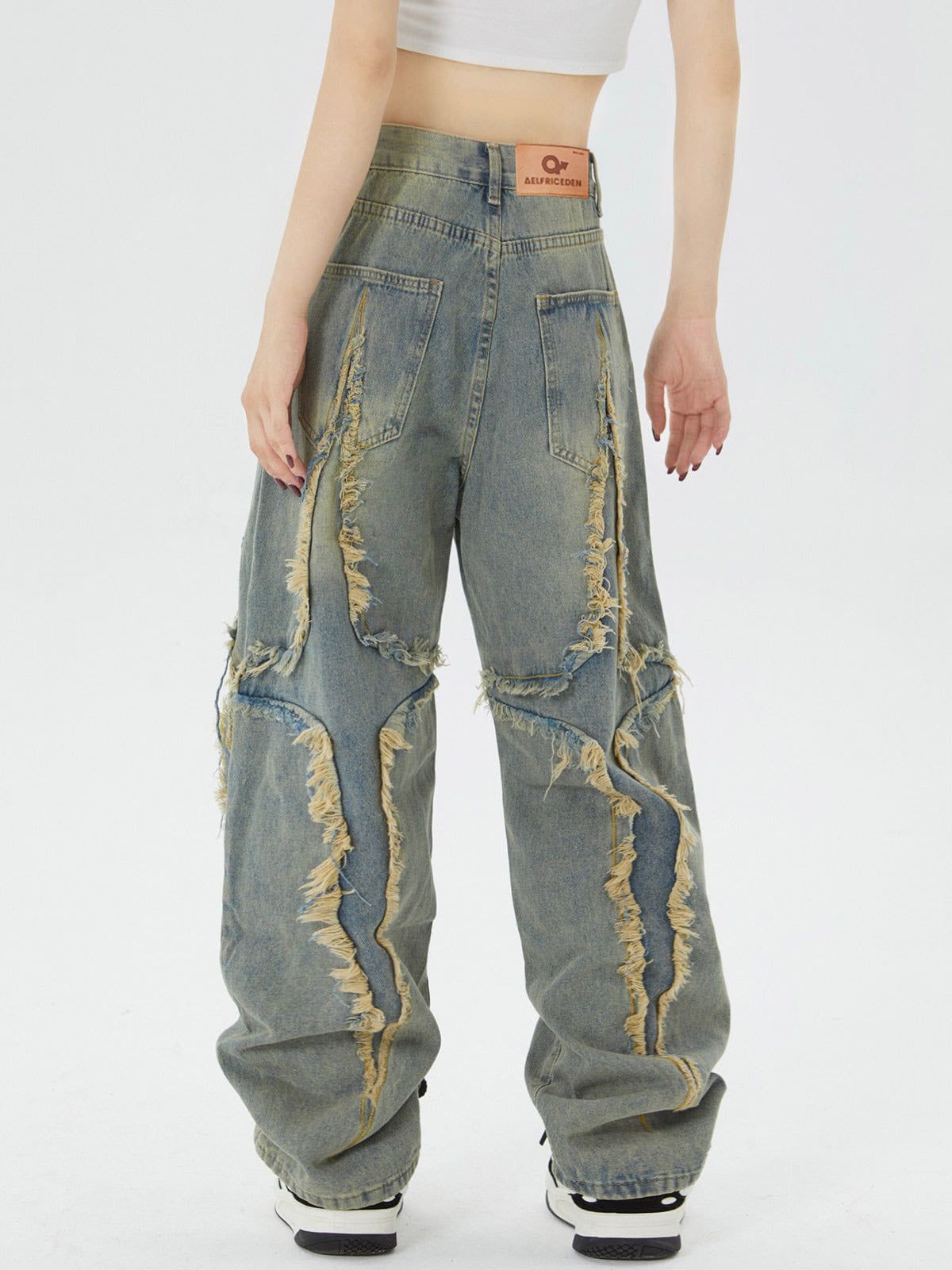 "X" Washed Fringe Jeans